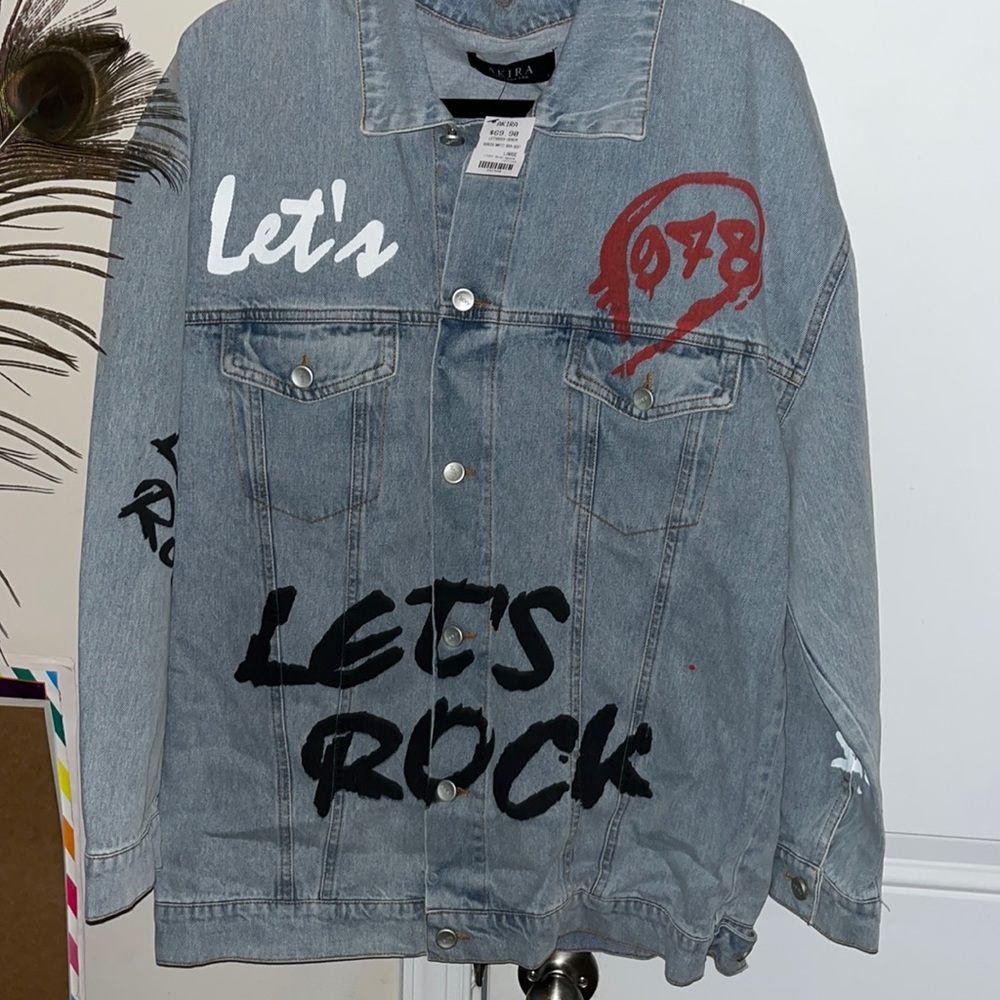 AKIRA woman’s oversized graffiti denim jacket. Size Large. NWT